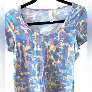 Lularoe XS classic T shirt . Cotton‎ feel . Floral over geometric . NWT.